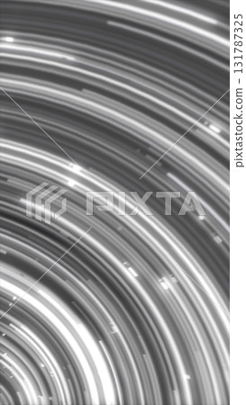 Abstract black and white spiral light trails forming circular motion with glowing dynamic streaks Abstract black and white spiral light trails forming circular motion with glowing dynamic streaks 131787325