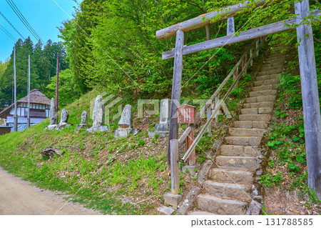 Benzaiten torii gate, stone steps, and Koshin tower at Ouchijuku, a thatched roof village in Shimogo Town, Minamiaizu County, Fukushima Prefecture 131788585