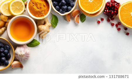 Natural Immune Boosters: Honey, Garlic, Berries, Turmeric Tea, Citrus Fruits Banner 131788671