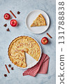 Homemade apple pie with sour cream filling on light background, top view. 131788838