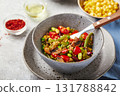 Quinoa with green beans, tomatoes, fried champignons, corn, red bell peppers, peas and soybeans. Healthy Vegetable Mix 131788842