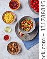 Quinoa with green beans, tomatoes, fried champignons, corn, red bell peppers, peas and soybeans. Healthy Vegetable Mix 131788845