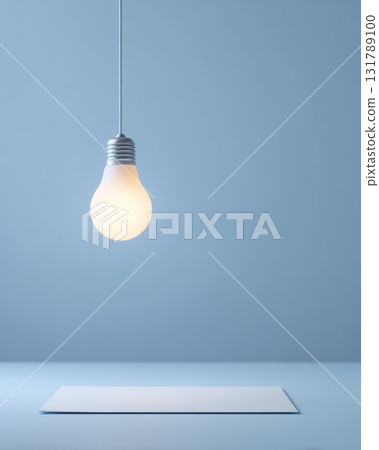 Glowing lightbulb symbolizes bright idea and inspiration. concept for creativity, innovation and solution on clean minimalist background with ample copy space 131789100