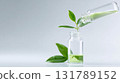 Laboratory research showing plant growth and biotechnology science. Pouring green organic natural liquid into glass vial creating hopeful and innovative cosmetic 131789152