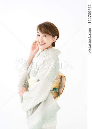 Woman in Japanese clothing, vertical and profile Woman in Japanese clothing, vertical and profile 131789751