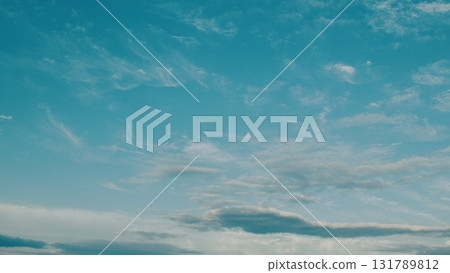 The stunning and mesmerizing blue sky adorned with wispy clouds showcases true natural beauty 131789812