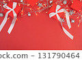 Festive Christmas background with red gifts and twinkling lights 131790464