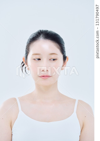 A woman with a troubled face 131790497