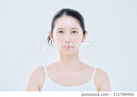 A woman with a troubled face 131790498
