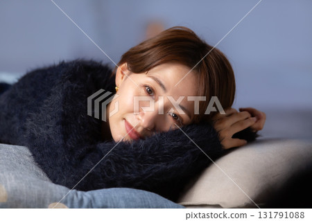 Woman napping winter Woman napping winter 131791088