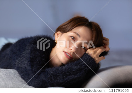Woman napping winter Woman napping winter 131791095