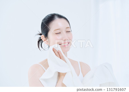 Washing face image of a young woman Washing face image of a young woman 131791607