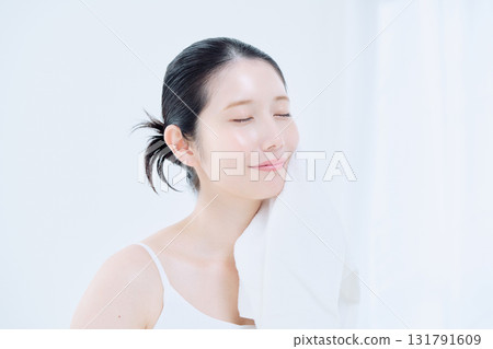 Washing face image of a young woman Washing face image of a young woman 131791609