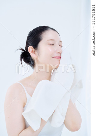 Washing face image of a young woman Washing face image of a young woman 131791611