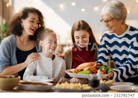 Family celebrating Thanksgiving Day 131791747