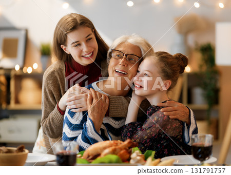 Family celebrating Thanksgiving Day Family celebrating Thanksgiving Day 131791757