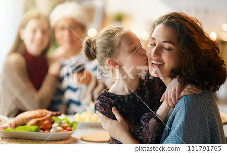Family celebrating Thanksgiving Day Family celebrating Thanksgiving Day 131791765