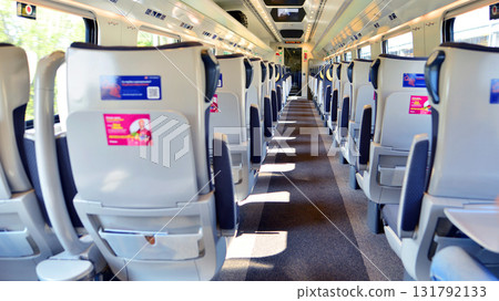 Warsaw, Poland. 15 July 2025. Interior of a passenger train. Empty chairs in the wagon. PKP Intercity. Interior of a Pendolino carriage. 131792133
