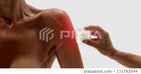 Shoulder pain treatment using ice cube for inflammation relief. Vibrant collage 131792644