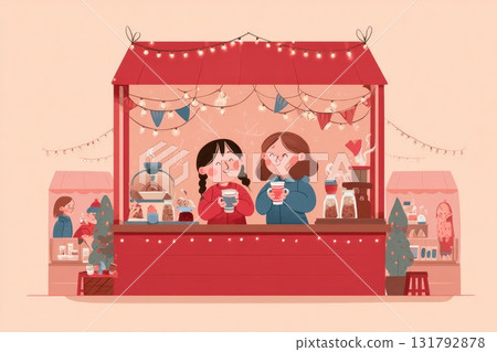 Two cheerful women enjoying warm beverages at a festive market stall with colorful decorations 131792878