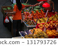 Fruits such as oranges sold at the open-air market. Most of them are imported. 131793726