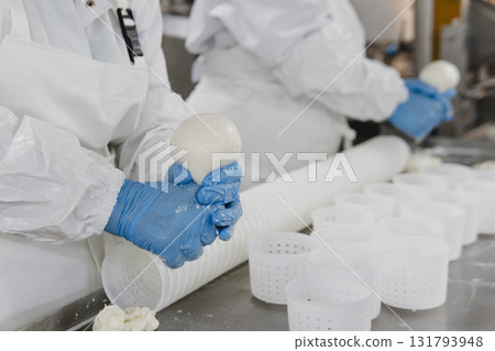 Mozzarella cheese factory. Produces handmade mozzarella with fresh milk, close up 131793948