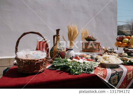 A large plate of pilaf with rice and raisins on a festive table 131794172