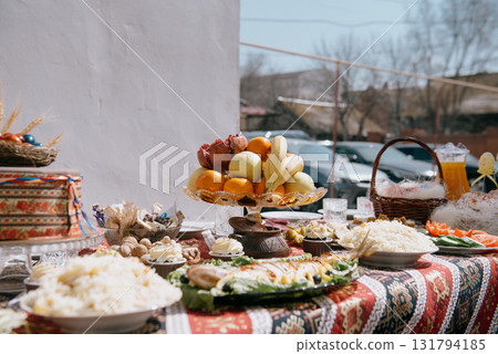 A large plate of pilaf with rice and raisins on a festive table A large plate of pilaf with rice and raisins on a festive table 131794185