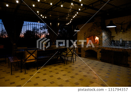 Outdoor brick barbecue complex with a cauldron and tandoor oven 131794357