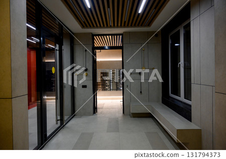Interior of the lobby with metal elevators 131794373
