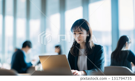 A young woman working in a stylish coworking space A young woman working in a stylish coworking space 131794735