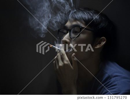 Man smoking a cigarette 131795270