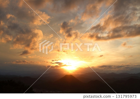 Sunset over the mountains 131795973