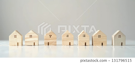Row of small wooden houses on neutral background minimal real estate concept 131796515