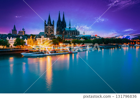 Great St. Martin Church And Dom In Cologne At Evening With Reflection In River Rhine, Germany Great St. Martin Church And Dom In Cologne At Evening With Reflection In River Rhine, Germany 131796836