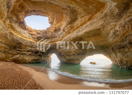 Kayak rests at the famous Benagil sea cave in Algarve Portugal 131797077