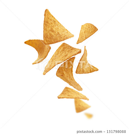 Corn chips of triangular shape levitate on a white background Corn chips of triangular shape levitate on a white background 131798088