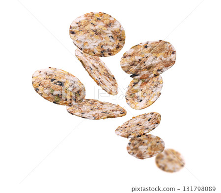 Round Crispbread levitate on a white background Round Crispbread levitate on a white background 131798089