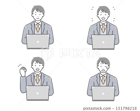 一名穿著西裝的男子在電腦上工作 131798218