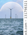 Rainbow out at sea at offshore wind farm 131798321