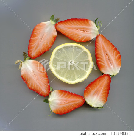 strawberries and a lemon slice strawberries and a lemon slice 131798333