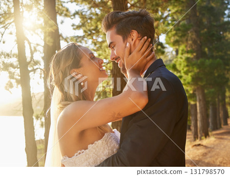 Wedding, married and love of happy couple in park, forest and nature for celebration of union, care and marriage. Bride, groom and smile in garden for romance, bridal event and celebrate commitment Wedding, married and love of happy couple in park, forest and nature for celebration of union, care and marriage. Bride, groom and smile in garden for romance, bridal event and celebrate commitment 131798570