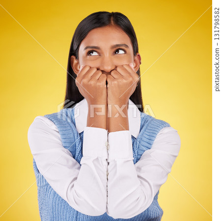 Silly, woman and happy in a studio with a female model feeling playful and cute. Isolated, yellow background and young person with funny, comic and goofy happiness with emoji and fun joke alone Silly, woman and happy in a studio with a female model feeling playful and cute. Isolated, yellow background and young person with funny, comic and goofy happiness with emoji and fun joke alone 131798582