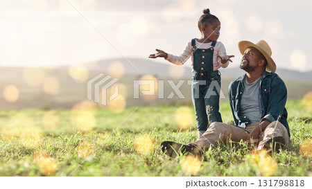 Bonding, relax and father and child on a field for playing, adventure and conversation in nature. Agriculture, communication and African dad talking to a playful girl on the grass in the countryside Bonding, relax and father and child on a field for playing, adventure and conversation in nature. Agriculture, communication and African dad talking to a playful girl on the grass in the countryside 131798818