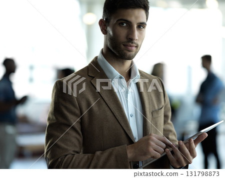 Technology, face and portrait of businessman with tablet, confident business leader in Saudi Arabia. Research, leadership and agency ceo networking, online communication in management at startup. Technology, face and portrait of businessman with tablet, confident business leader in Saudi Arabia. Research, leadership and agency ceo networking, online communication in management at startup. 131798873