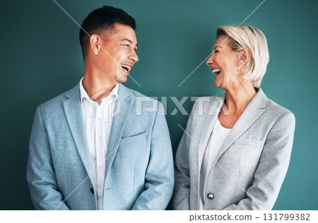 Mockup, business people and laughing team in studio for fun and happy conversation or comedy on green background.Partnership and man with senior woman with humor, joke or discussion while isolated 131799382