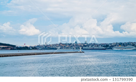 Istanbul, Turkey. Scenic view of the Bosphorus Strait with city view in the background. Urban skyline and city life. Istanbul, Turkey. Scenic view of the Bosphorus Strait with city view in the background. Urban skyline and city life. 131799390