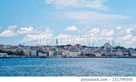 Istanbul, Turkey. Scenic view of the Bosphorus Strait with city view in the background. Urban skyline and city life. Istanbul, Turkey. Scenic view of the Bosphorus Strait with city view in the background. Urban skyline and city life. 131799395
