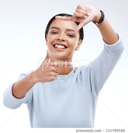 Frame, hands and portrait of woman on a white background for beauty, cosmetics and natural makeup. Fashion, focus mockup and face of girl isolated with happiness, smile or photography emoji in studio 131799566