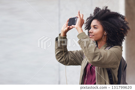 Black woman, phone photography and travel in the city for tourism or sightseeing in the outdoors. Happy African American female tourist taking picture with mobile smartphone in a urban town on mockup Black woman, phone photography and travel in the city for tourism or sightseeing in the outdoors. Happy African American female tourist taking picture with mobile smartphone in a urban town on mockup 131799620